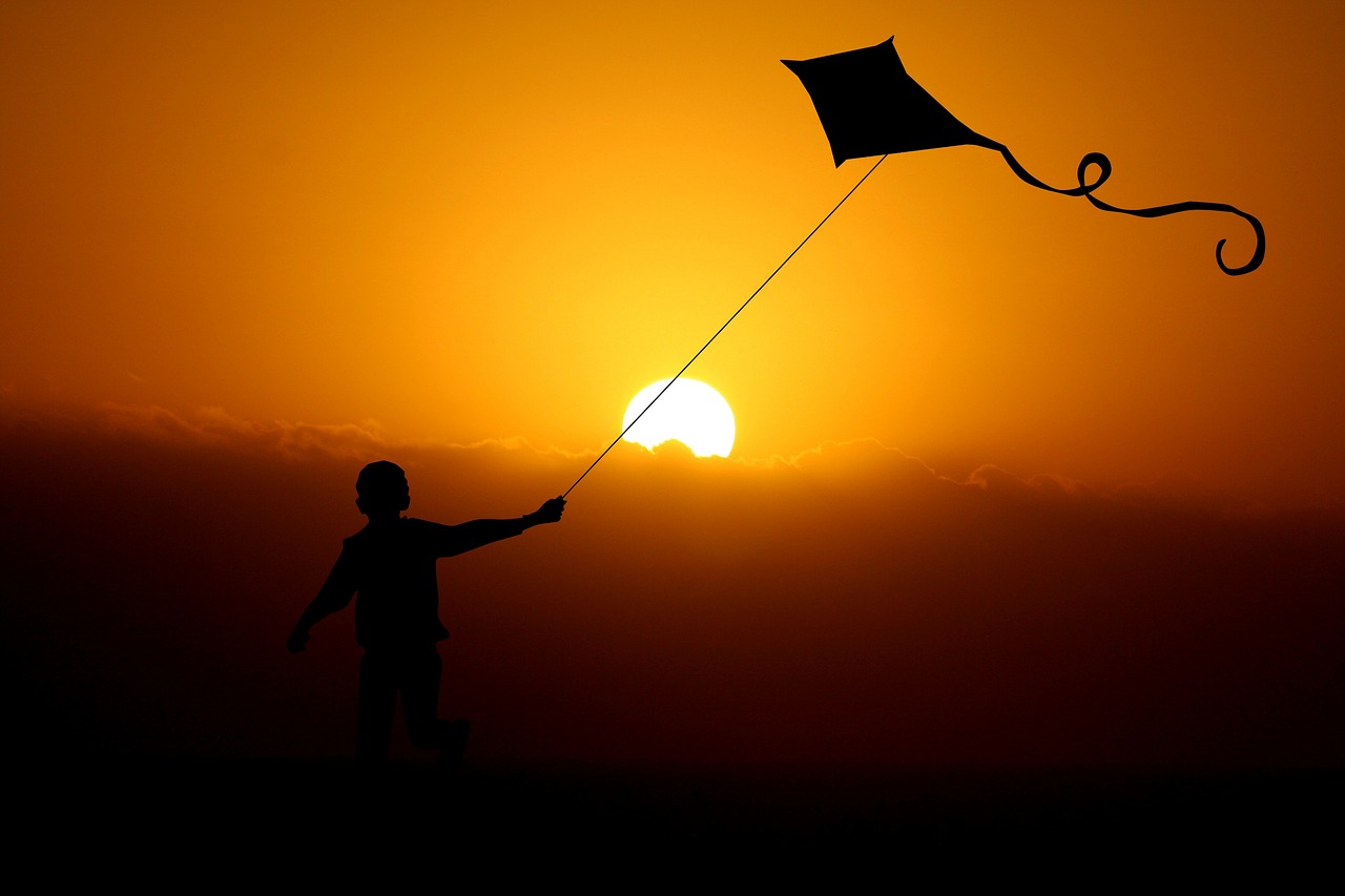 Child Flying a Dragon Kite